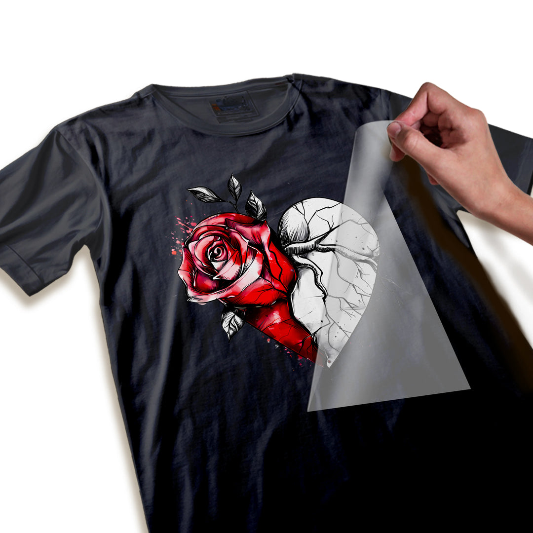 Close-up detail view of Valentine DTF transfer showing red rose petals, black leaves, and cracked heart line work quality