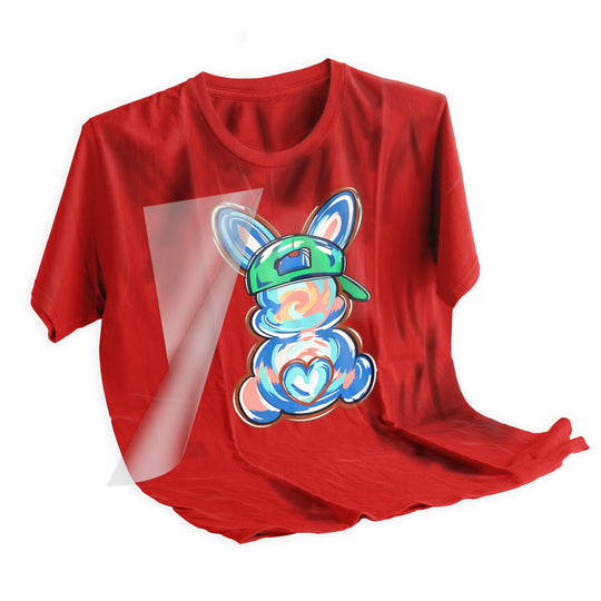 Tie-dye bunny DTF transfer applied to light colored t-shirt showing final pressed result with vibrant colors and clear design details