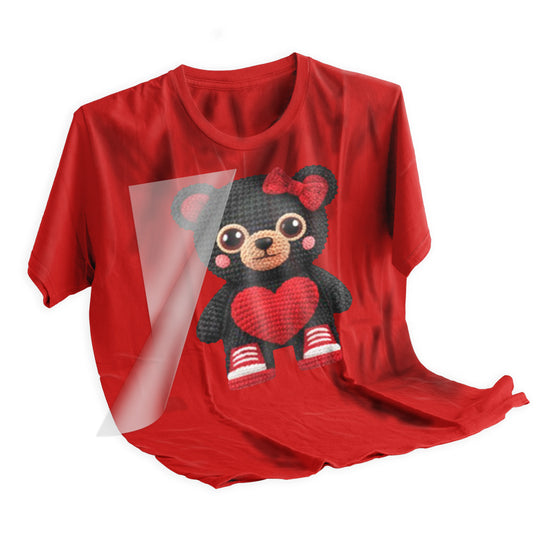 Valentine bear DTF transfer being applied to t-shirt with heat press showing application process