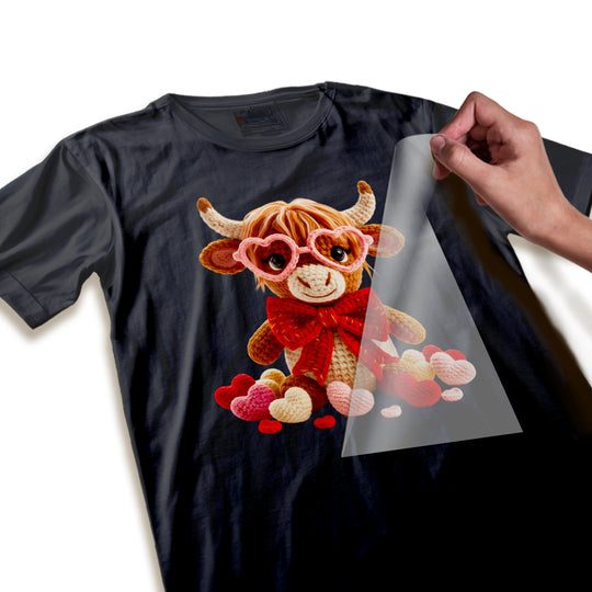 Close-up detail of highland cow DTF transfer showing yarn-like textured appearance, dimensional hearts, and quality print details