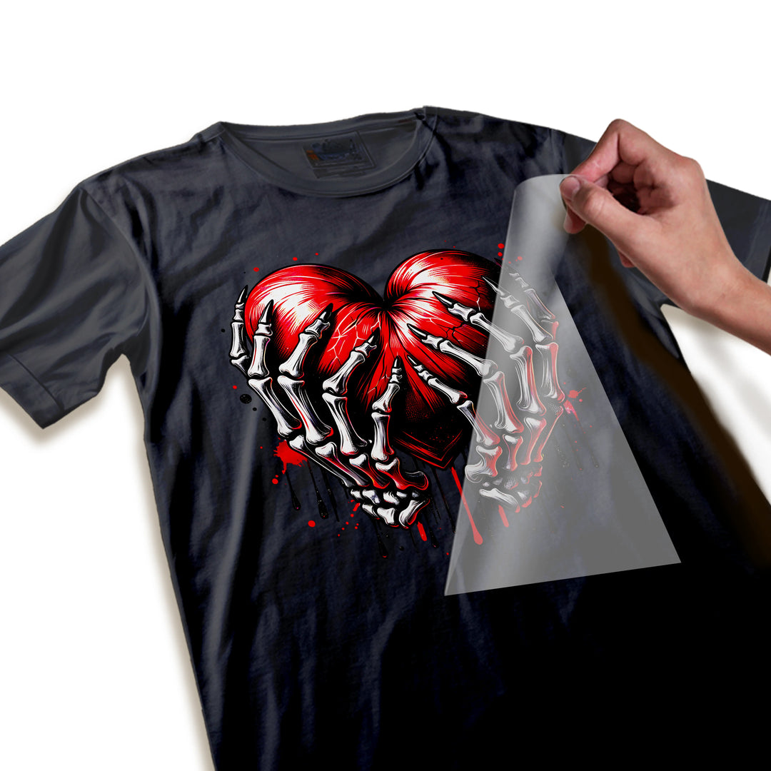 Close-up detail shot of Valentine skeleton hands heart DTF transfer showing fine line work, shading details, and vibrant red color quality