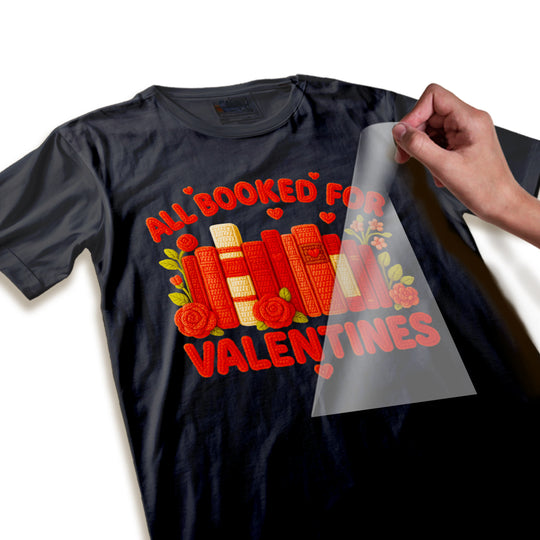 Close-up detail of yarn-textured Valentine DTF transfer showing dimensional book spines and rose embellishments