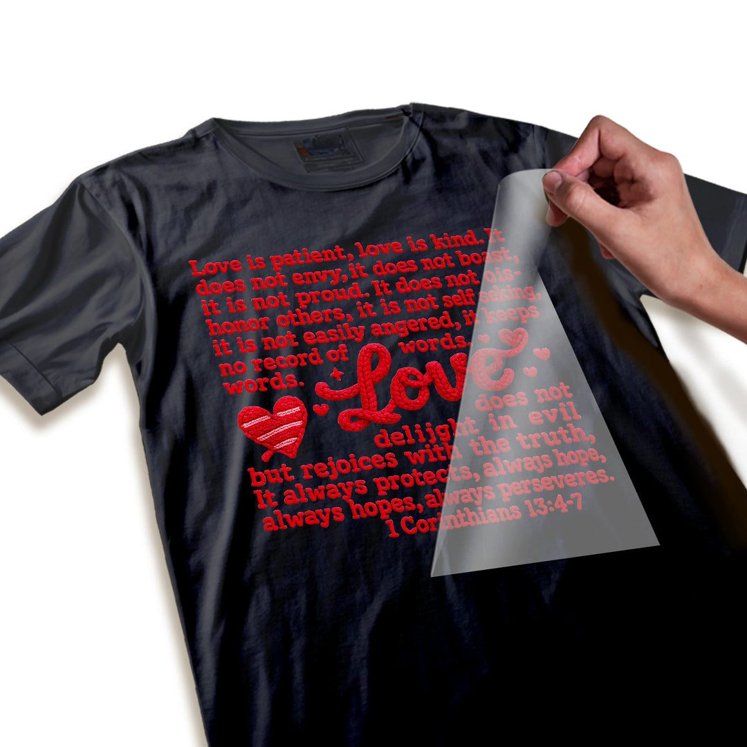 Close-up detail of Love Is Patient DTF transfer showing textured red lettering quality and heart embellishment details