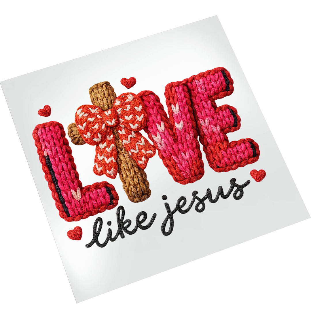 Valentine DTF transfer showing Love Like Jesus text with dimensional knitted appearance and small heart accents ready to press