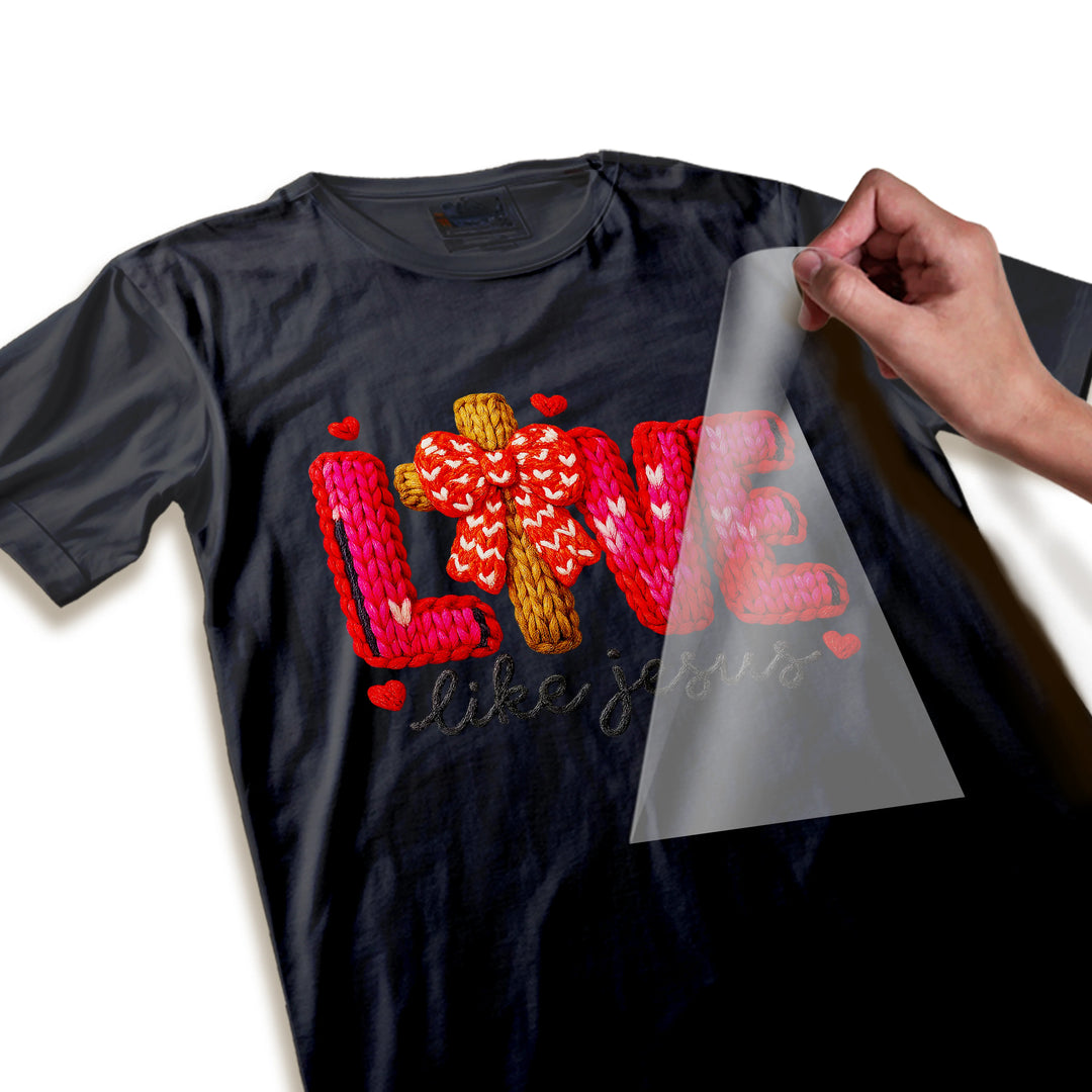 Close-up detail of Love Like Jesus DTF transfer showing dimensional yarn texture and intricate knitted pattern design