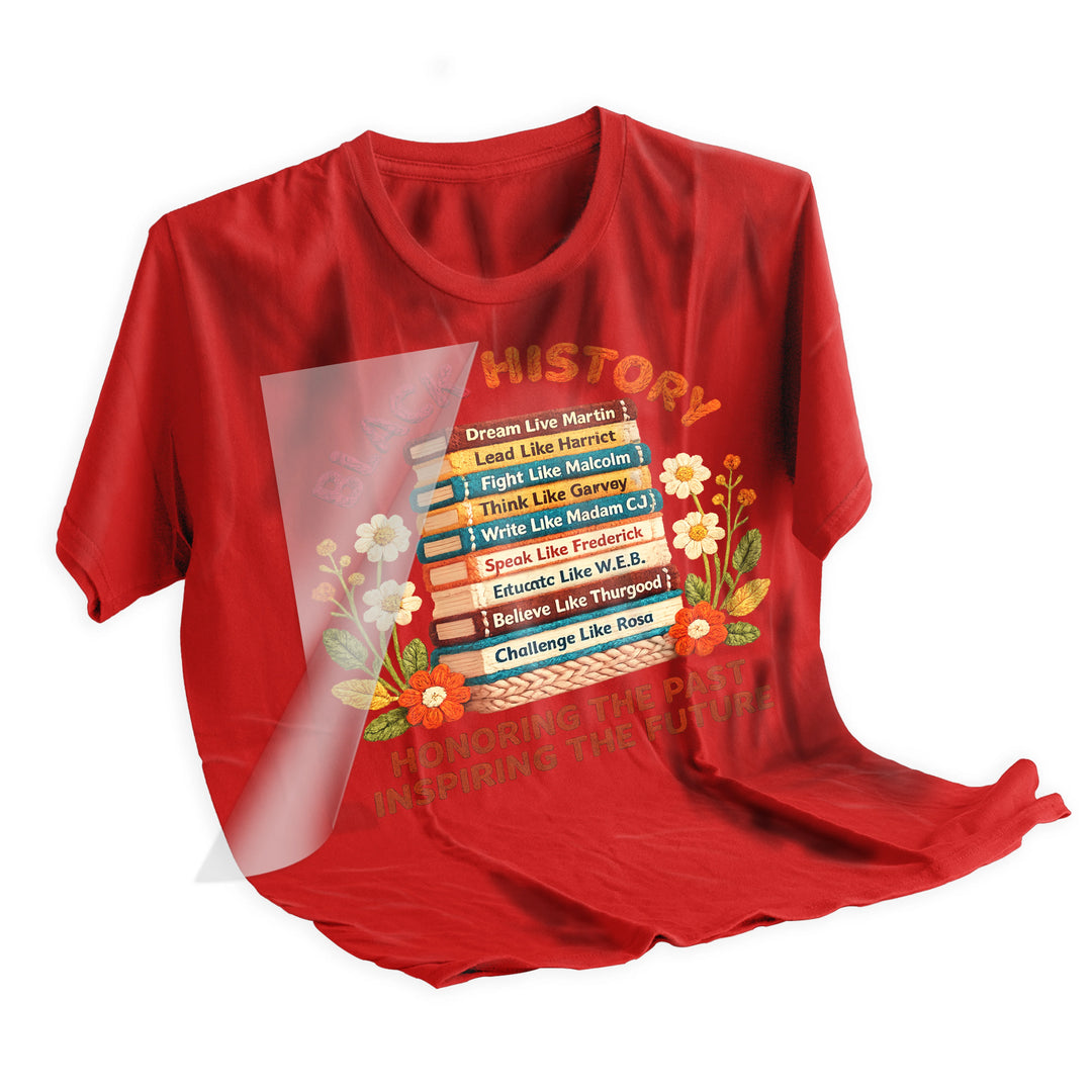 Black History DTF transfer applied to dark colored t-shirt showing vibrant book stack design celebrating Black excellence and achievement