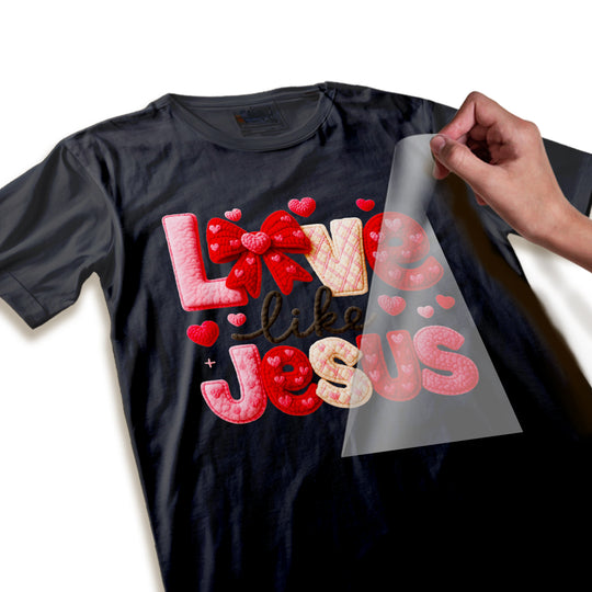 Close-up detail shot of Love Like Jesus Valentine DTF transfer showing dimensional yarn texture and heart embellishments