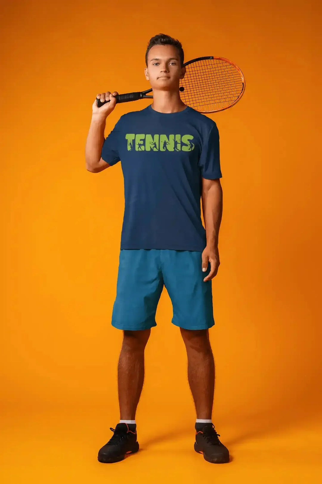 Young man wearing a blue shirt featuring a Tennis Player DTF transfer, perfect for showcasing love for the sport.